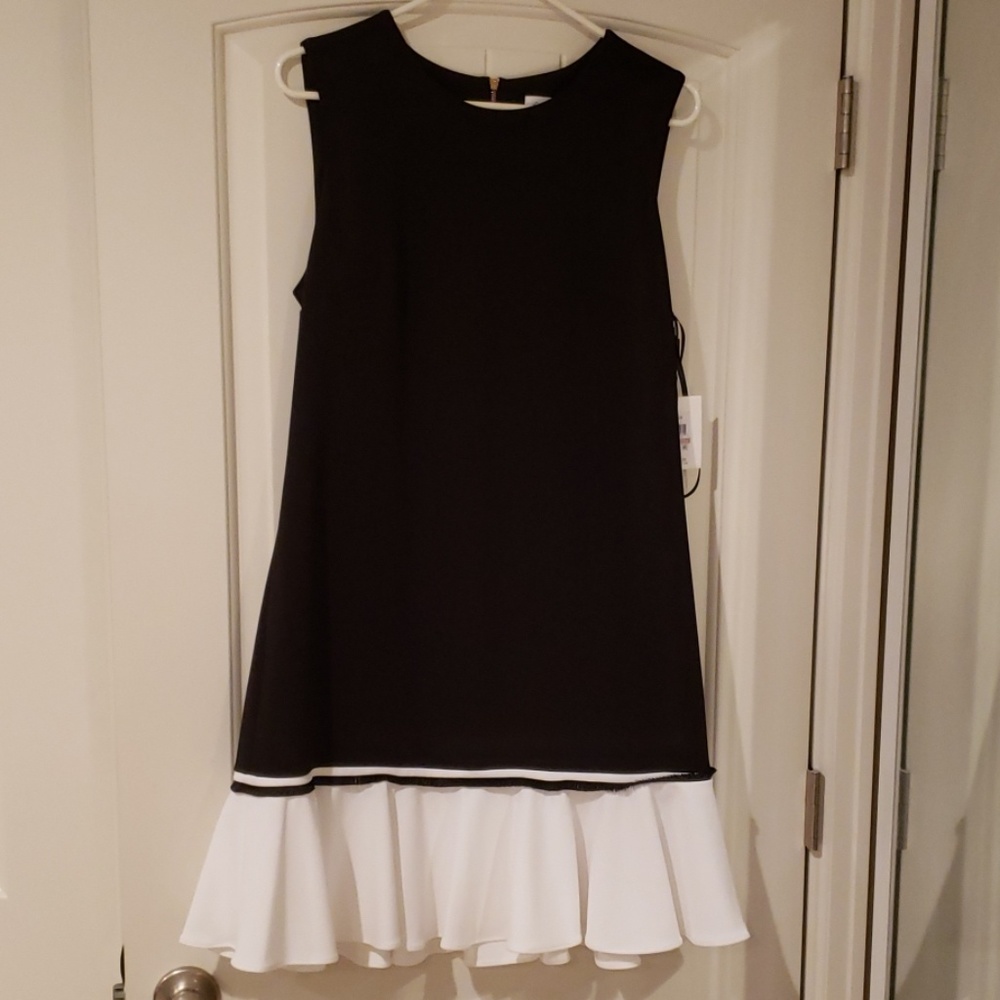 Calvin Klein black dress with white ruffle hem